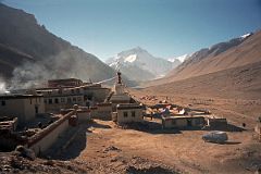 
The Rongbuk Monastery with its umbrella and spire-topped chorten connected to the ground with flapping prayer flags set a spectacular foreground for the classic early morning photo of the Everest North Face. Our camping spot is visible just to the right of the chorten.
